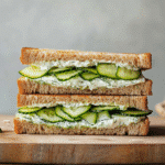 Cucumber and cream cheese sandwich on whole wheat bread
