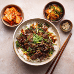 Slow Cooker Korean Beef 7 u4922897261 Korean beef served in a rice bowl with chopsticks 044bc273 6b4d 4937 a4cc eb7bb7af4114 0