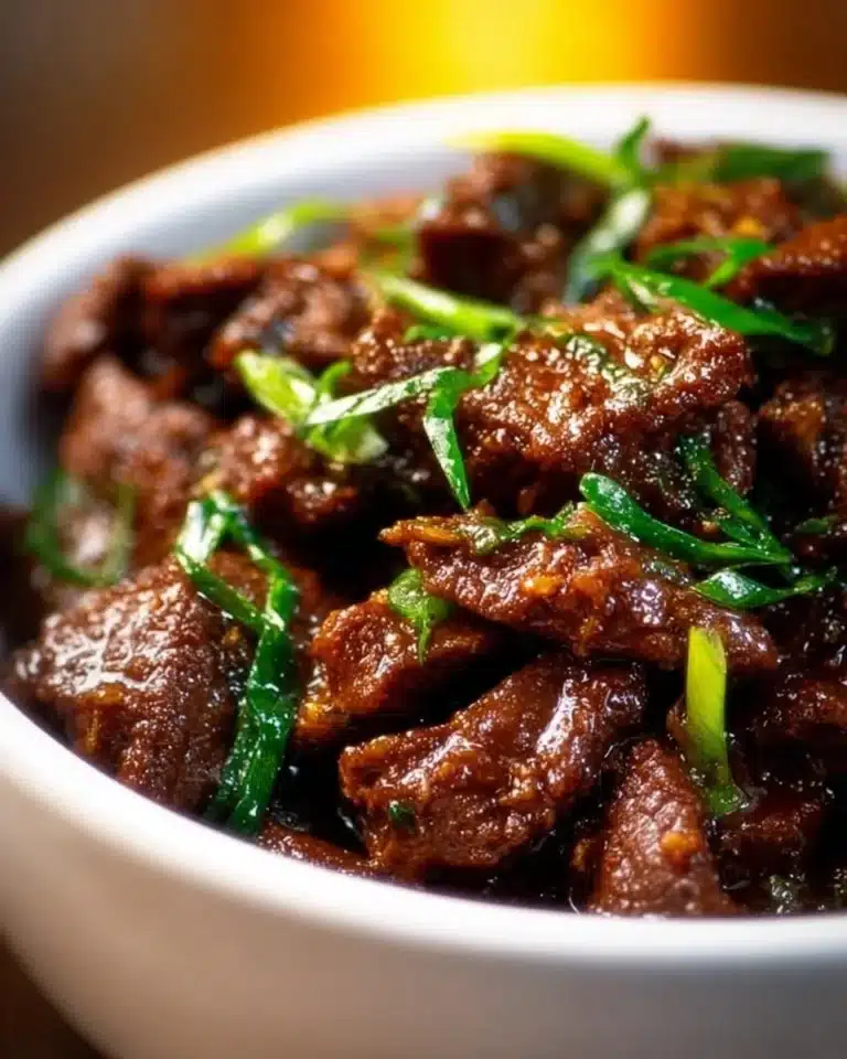 Slow Cooker Mongolian Beef 2 Delicious slow cooker Mongolian beef served with rice and vegetables