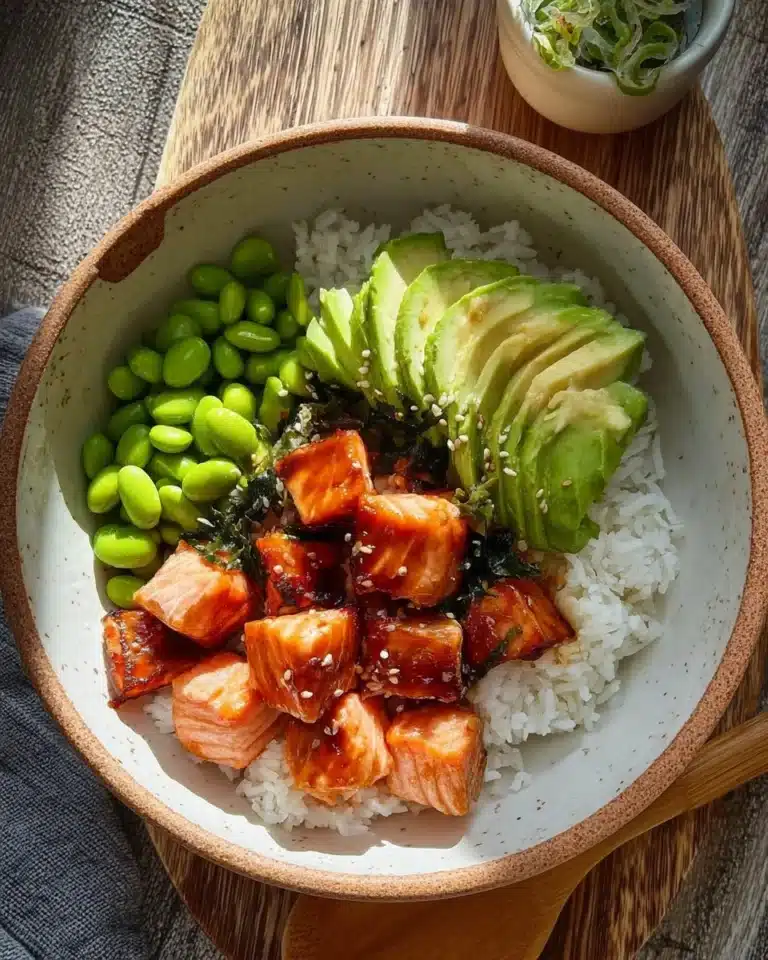 Gluten Free Teriyaki Salmon Sushi Bowl garnished with vegetables and rice